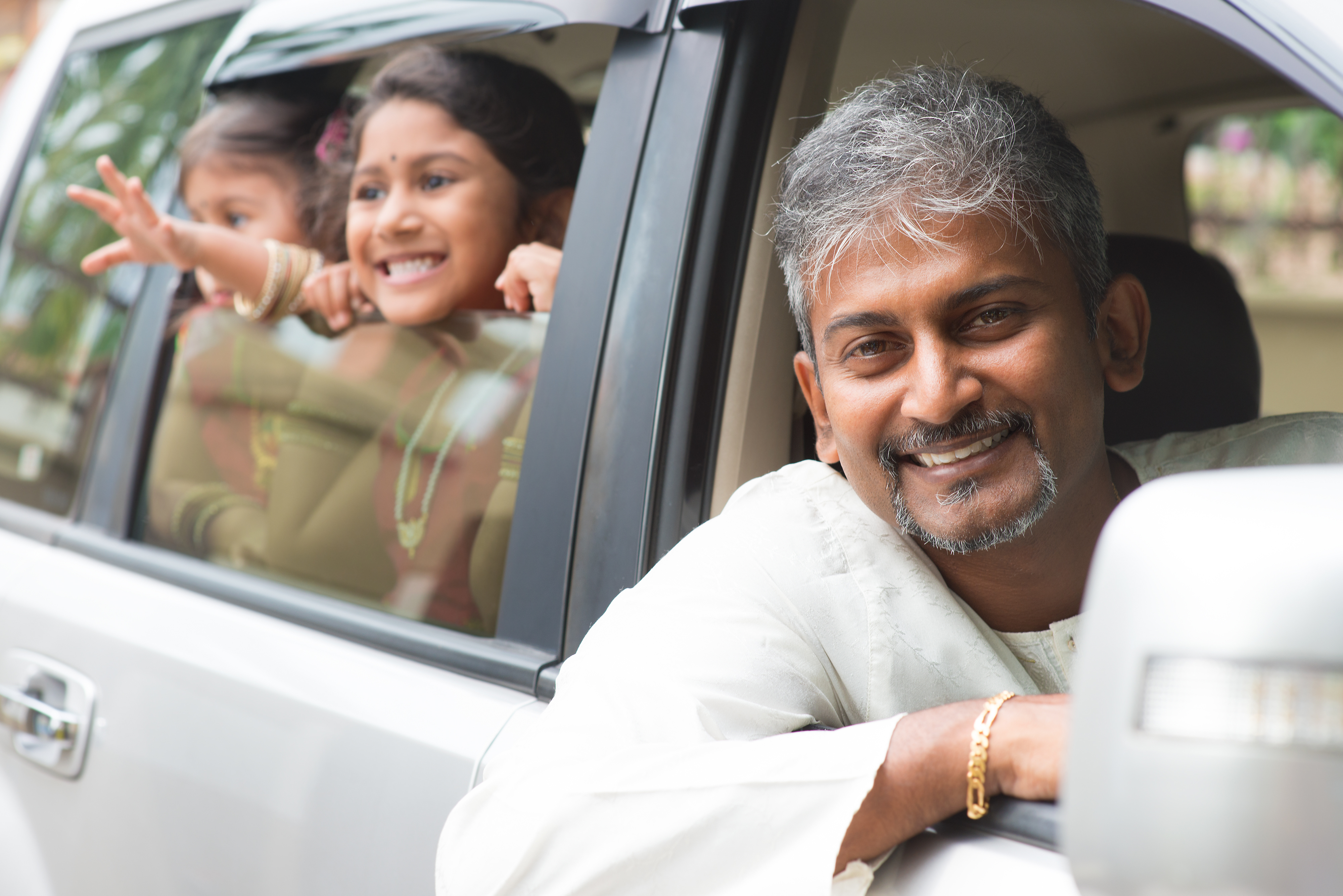 A family looking at a road map
