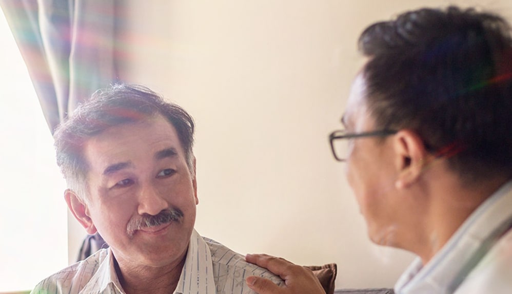 Kidney failure patient discussing with his doctor about kidney transplant
