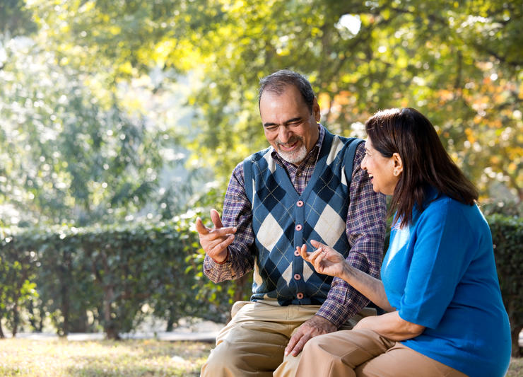 Senior couple smiling and conversing