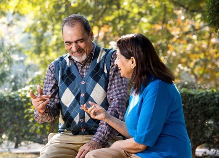 Indian elderly couple conversing about dialysis