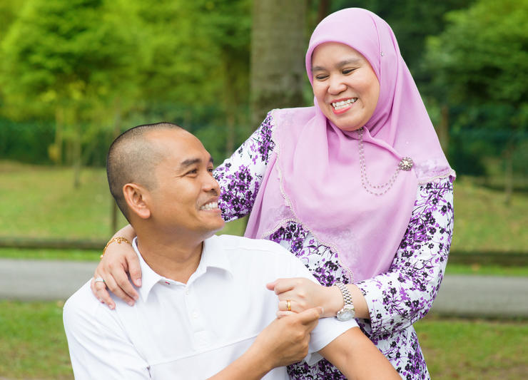 Couple supporting each other in the park