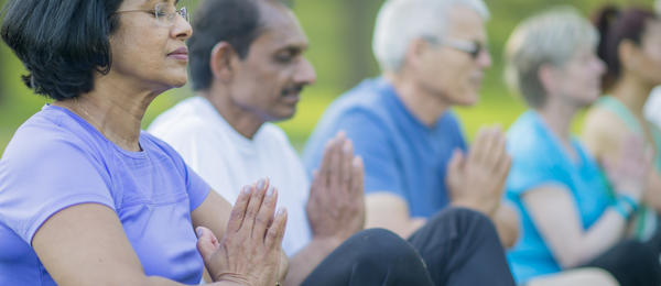 Seniors exercising in park